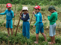 City kids in farm country of Tigerland Rice Farm